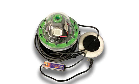 A green underwater LED light with batteries and wires.