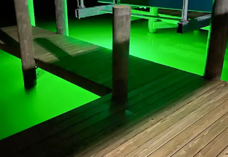A green colored light placed under the dock.