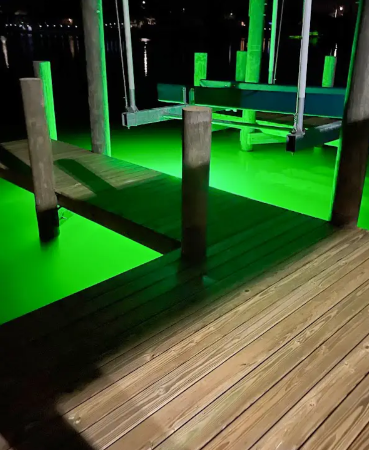 A green colored light placed under the dock.