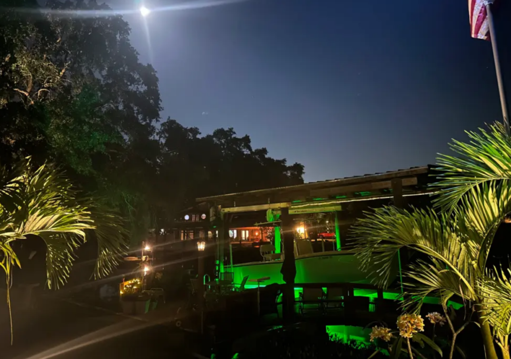 A green colored lighting meant for waterfront properties.