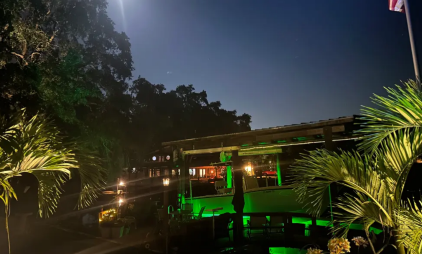 A green colored lighting meant for waterfront properties.