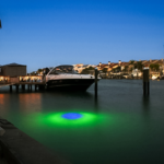 A dock area with a boat parked near the edge