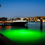 A dock area with a boat parked near the edge.