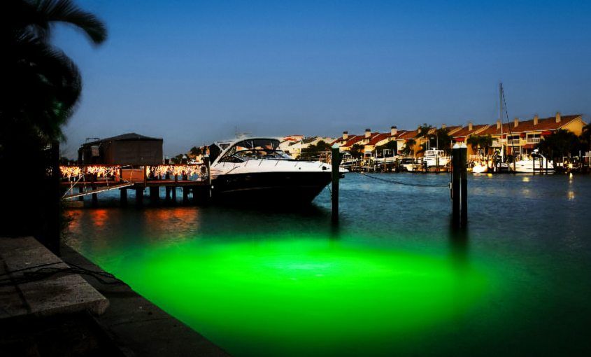 A dock area with a boat parked near the edge.