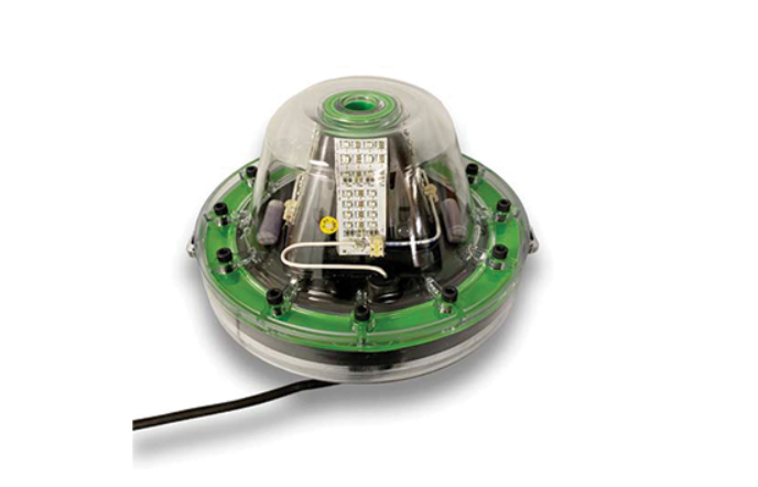A green colored underwater LED light meant for dock areas. 